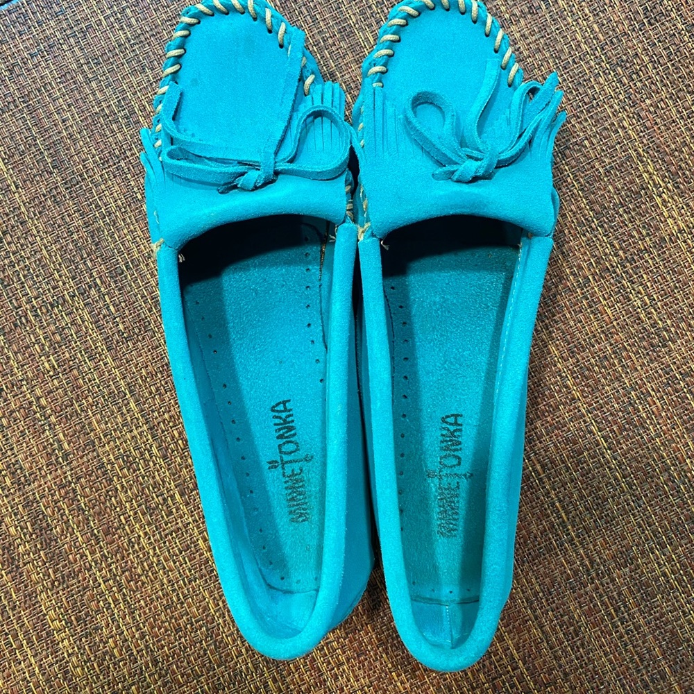 Turquoise Minnetonka slip ons size 9